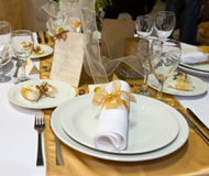 gold place setting for an anniversary party